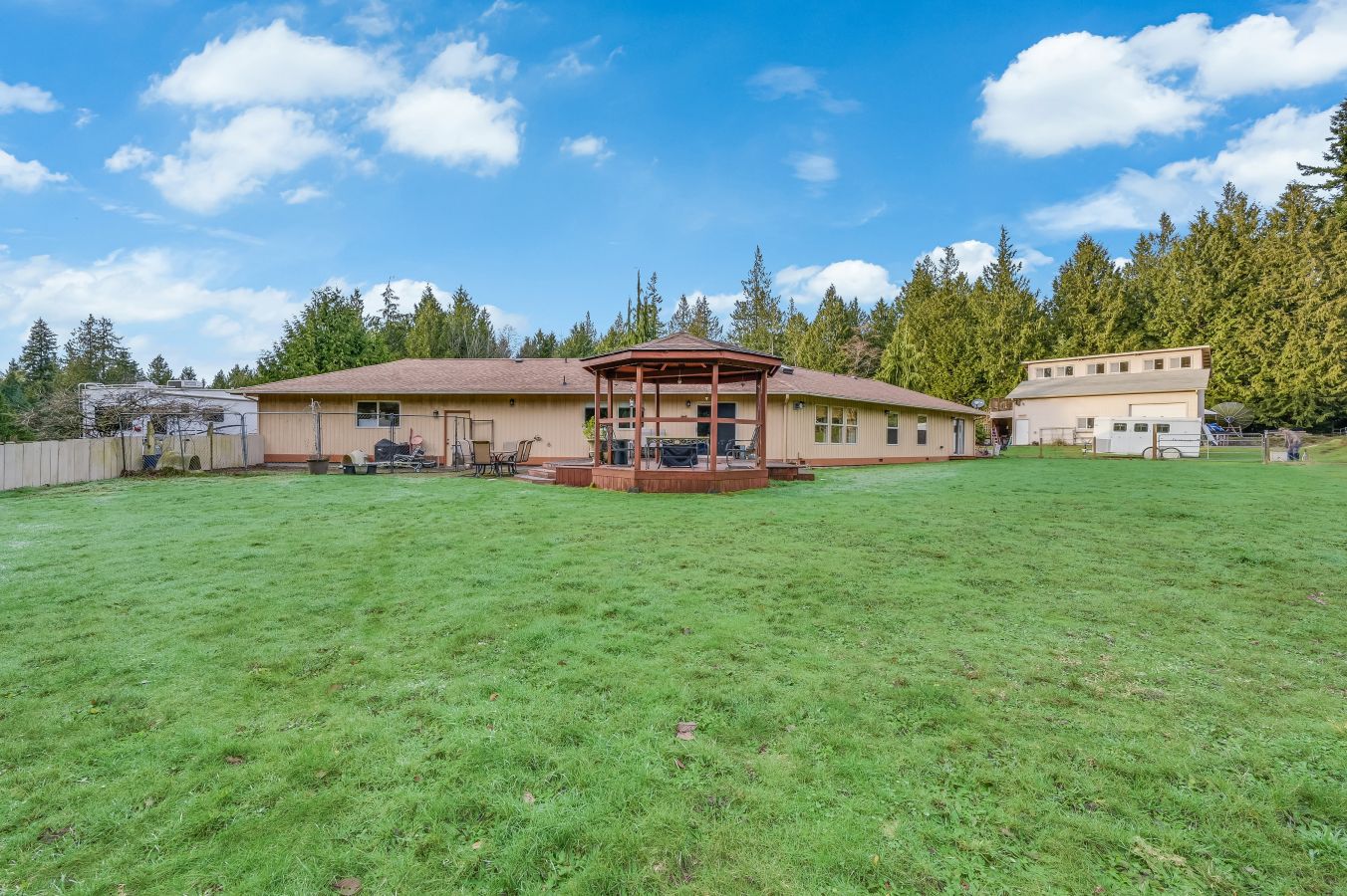 Visit Equestrian Ready Rambler on Shy 5 acres with huge shop!