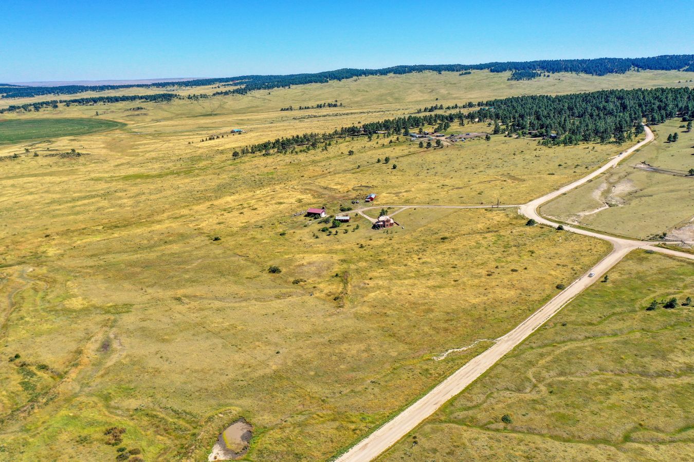 Visit Two Homes!! -  One Property - 35 Acres with Views of the Bijou Basin!!