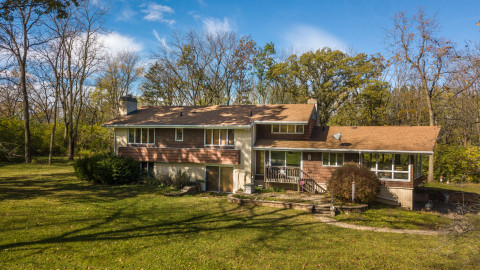 Visit Gorgeous Property on 21.8 acres with River Access, 2 outbuildings & stocked pond