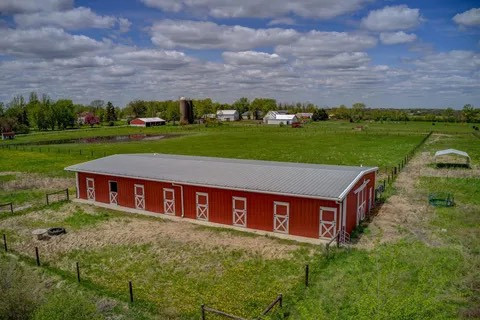 Visit NEW PRICE! 20 ACRES WITH TWO BARNS, ZONED AGRICULTURE AND BUILDABLE