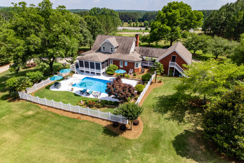 Visit Amazing custom built, one owner, brick home on over 8 acres