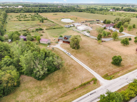 Visit Just Listed  - 10 Acres + Log Home & Outbuildings!